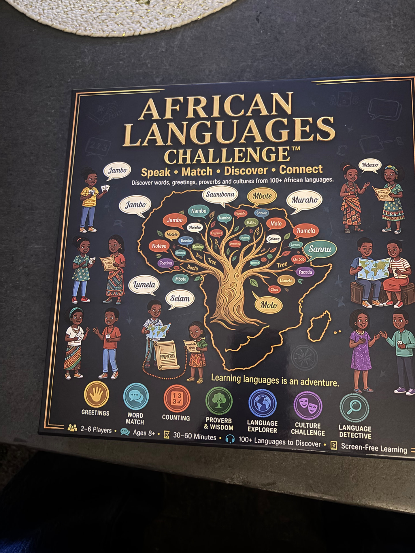 African Languages Challenge game box showing its illustrated Africa map and language prompts